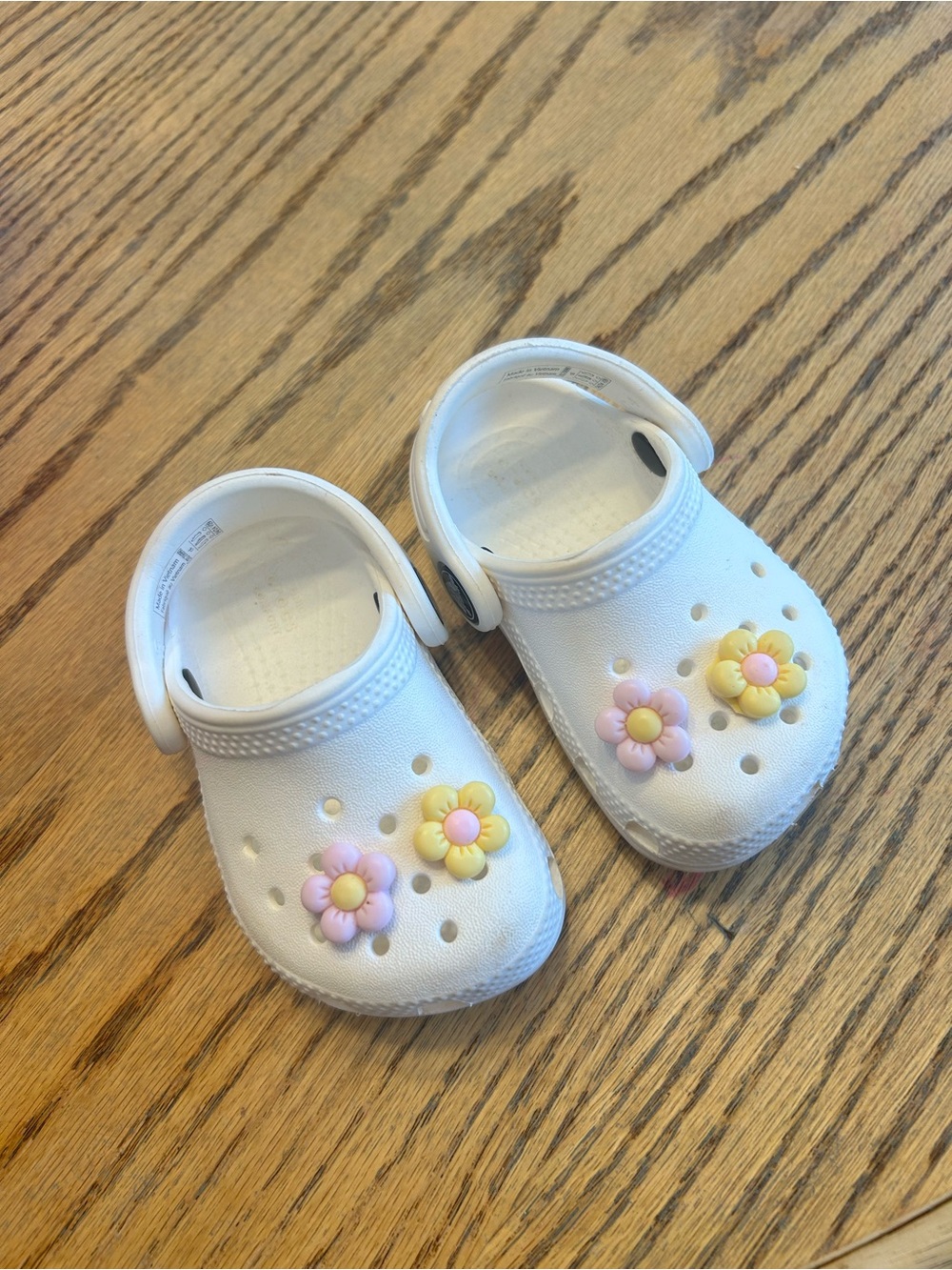 CROCS White Baby/Toddler size 4 with Pink & Yellow Flower Jibbitz